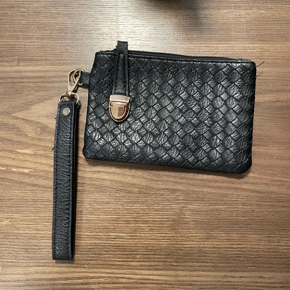Small Black Pattern Wristlet With Zipper & Metal Clasp Closure.